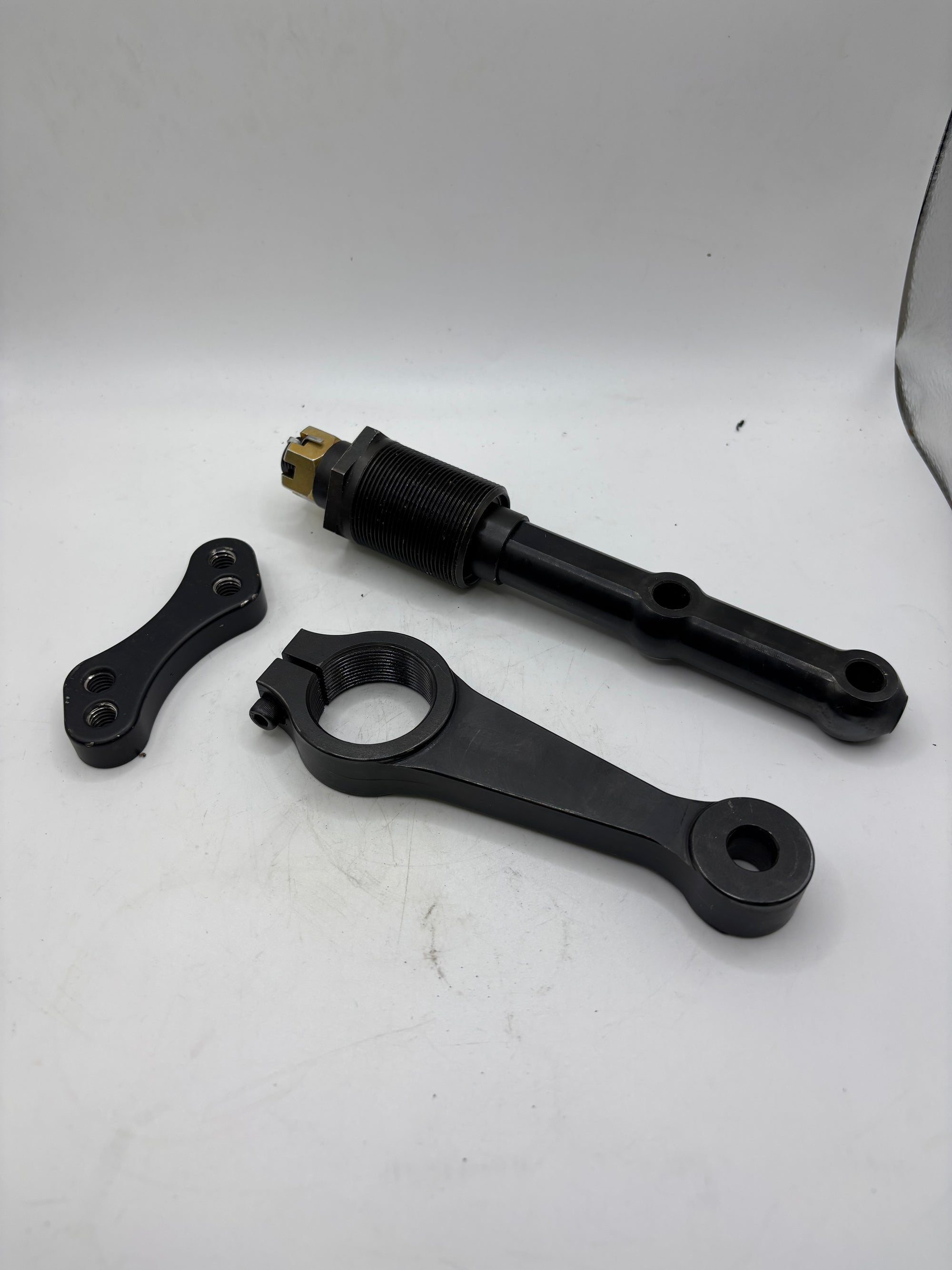 USED CHEVELLE ADJUSTABLE IDLER ARM WITH OFFSET BRACKET