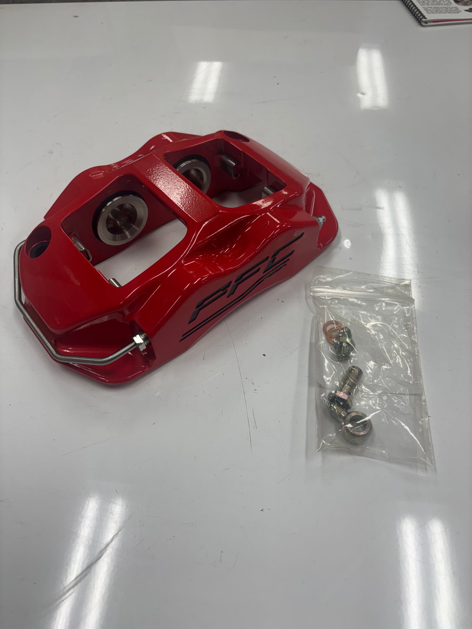 USED (NEW) PFC BRAKES CALIPER, R, 4 PISTON