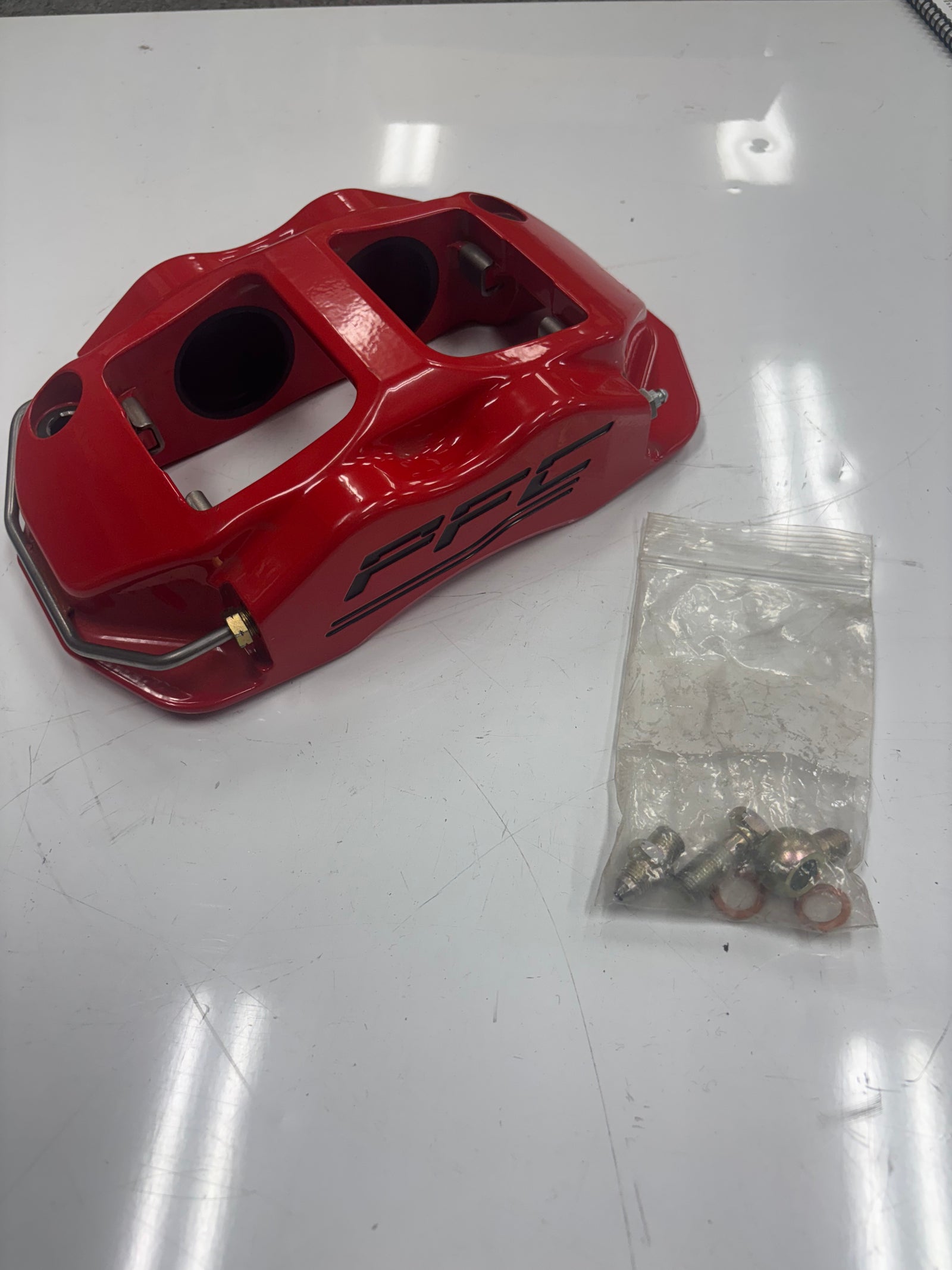 USED (NEW) PFC BRAKES ZR34 SERIES CALIPER, 4 PISTON, R REAR